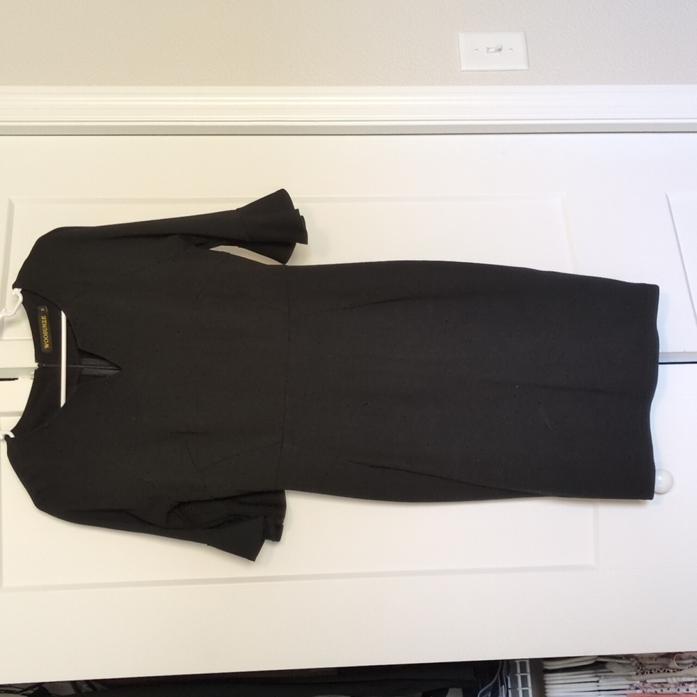 Black dress. Tight fitting. Size medium Woosunze brand